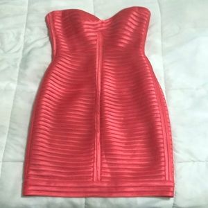 Salmon pink color. Sucks you in. Hugs the curves!